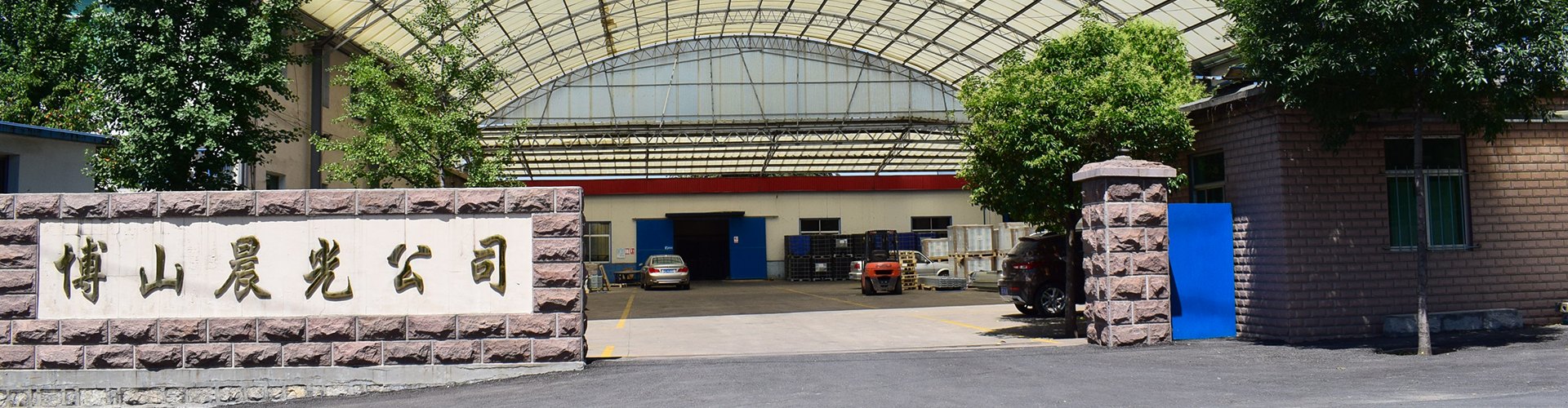DawnLite FRP factory in Zibo, Shandong — steel-structure workshop roofed with FRP daylighting sheets